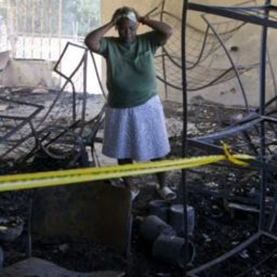 Число жертв пожара в детском доме на Гаити возросло Число жертв пожара в детском доме на Гаити возросло