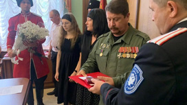 Родным кубанских казаков, погибших на Украине, передали их награды