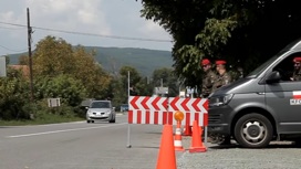На КПП между Сербией и Косово сожгли машину с косовской символикой
